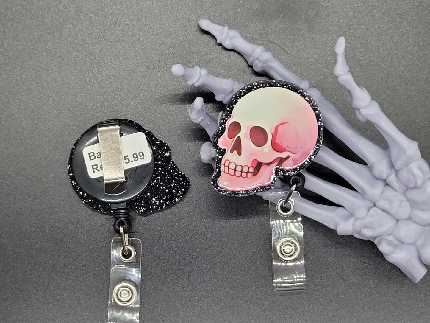 Black and Pink Glitter Acrylic Badge Reel Skull