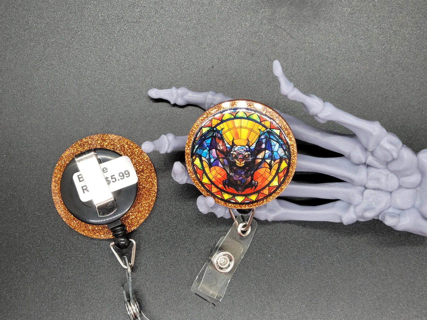 Orange Glitter Acrylic Bat Badge Reel
