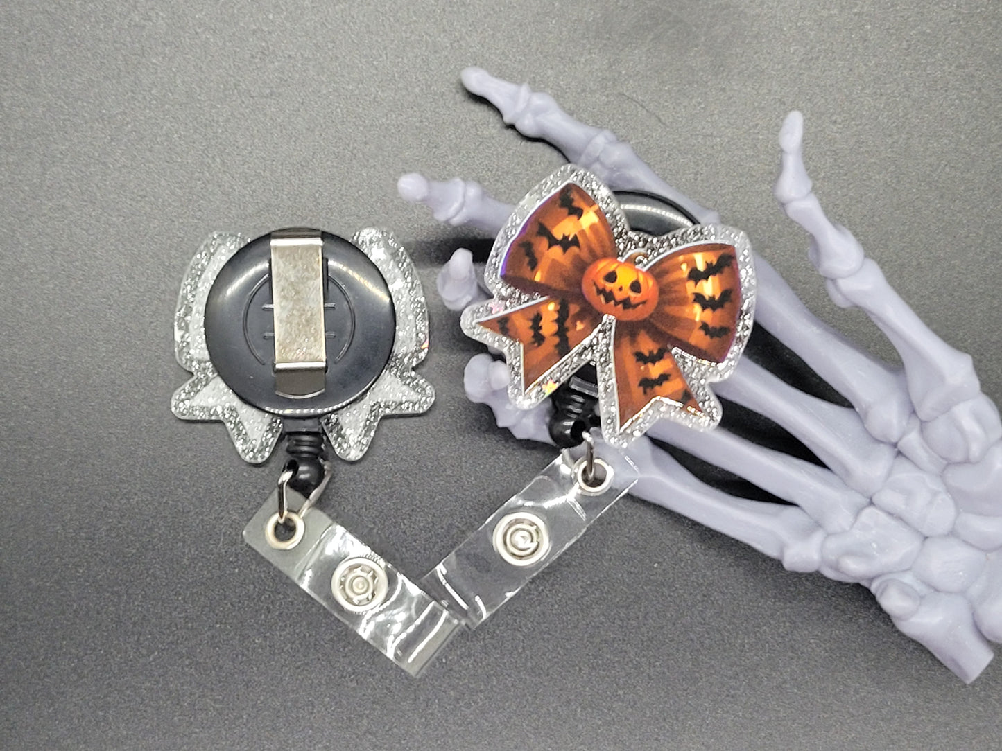 Silver Glitter Acrylic Badge Reel Orange Bow