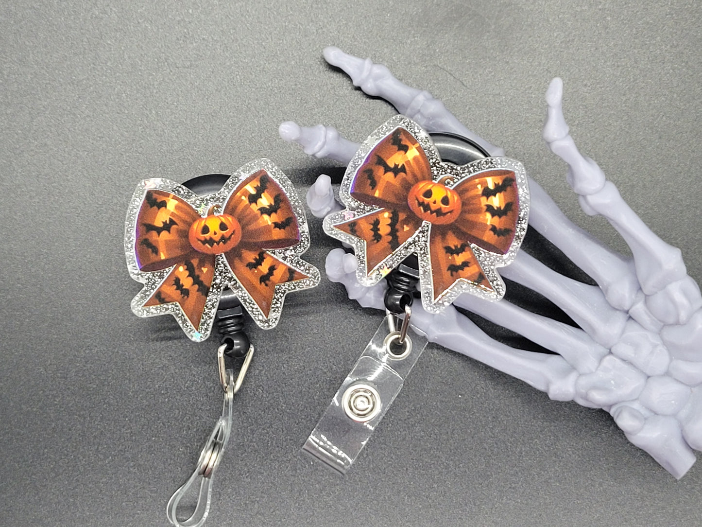 Silver Glitter Acrylic Badge Reel Orange Bow