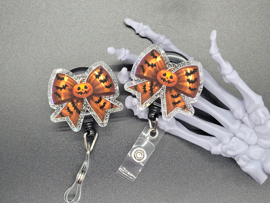 Silver Glitter Acrylic Badge Reel Orange Bow
